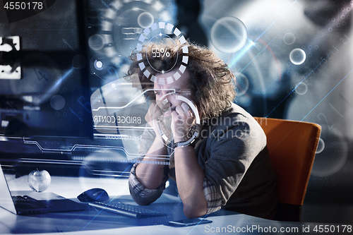 Image of businessman relaxing at the desk