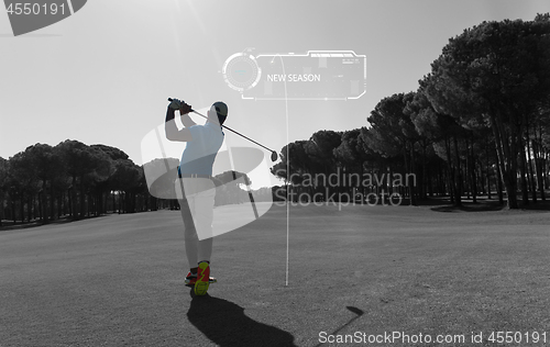 Image of Pro golf player shot ball from sand bunker