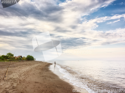 Image of a dark sand beach in northern Bali Indonesia