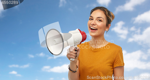 Image of young woman or teenage girl with megaphone