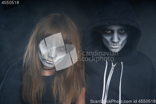 Image of Two preteen kids with zombie makeup
