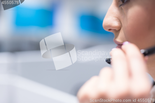 Image of female call centre operator doing her job