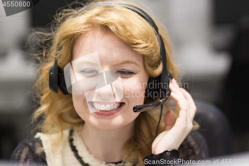 Image of female call centre operator doing her job