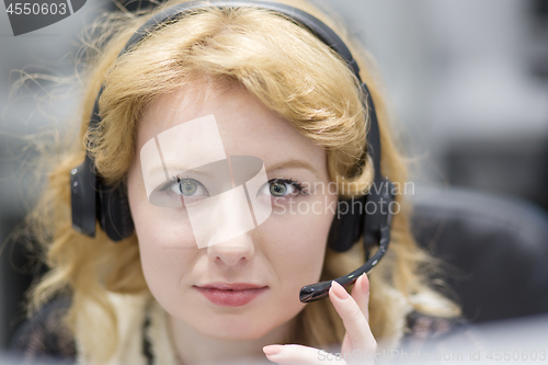 Image of female call centre operator doing her job