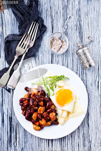 Image of fried bean with fried eggs