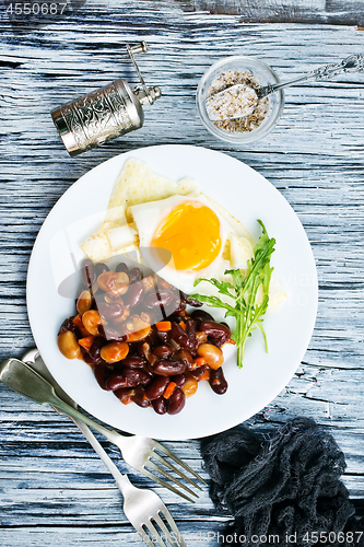 Image of fried bean with fried eggs