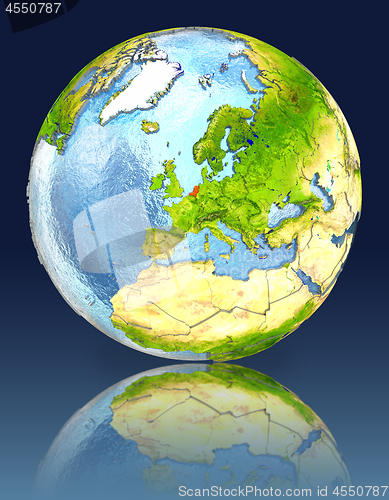Image of Netherlands on globe with reflection
