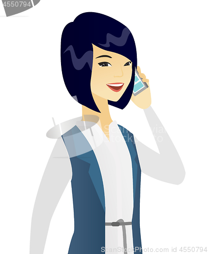 Image of Asian business woman talking on a mobile phone.