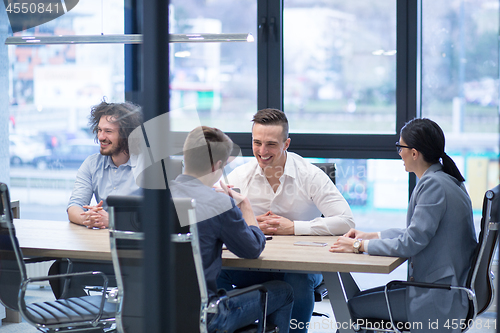 Image of Startup Business Team At A Meeting at modern office building