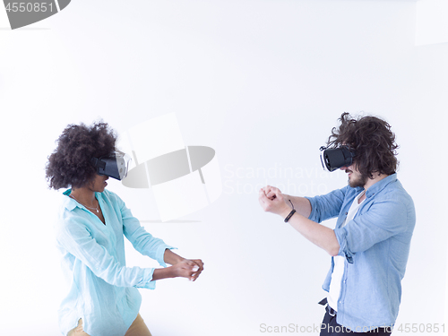 Image of multiethnic couple getting experience using VR headset glasses