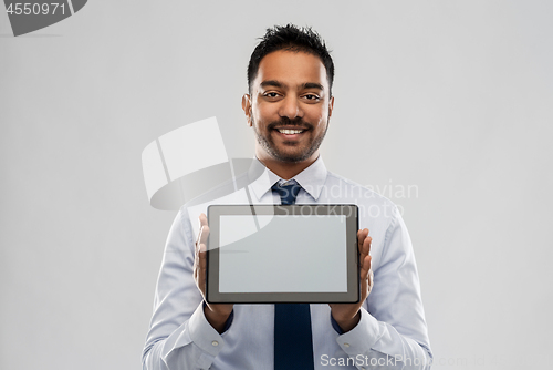 Image of indian businessman with tablet pc computer