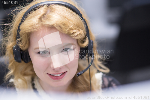 Image of female call centre operator doing her job