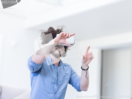 Image of man using VR-headset glasses of virtual reality