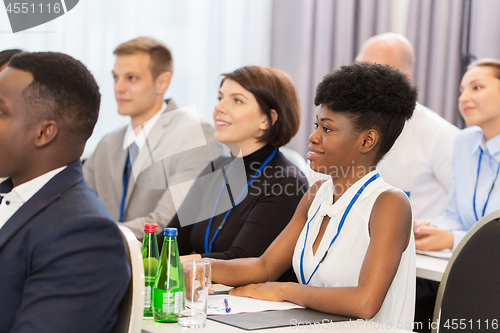 Image of happy business team at international conference