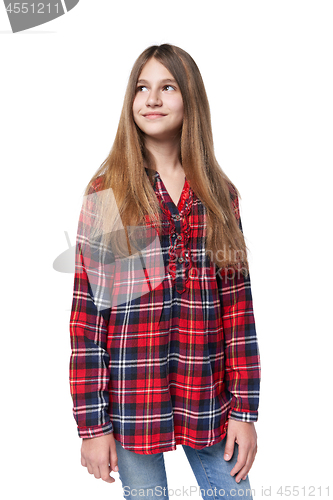 Image of Teen girl in checkered shirt standing casually