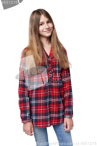 Image of Teen girl in checkered shirt standing casually