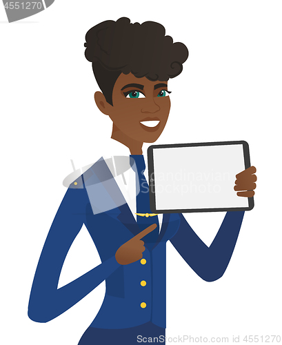 Image of Young african stewardess holding tablet computer.