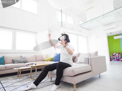 Image of man using VR-headset glasses of virtual reality