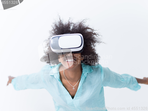 Image of black girl using VR headset glasses of virtual reality