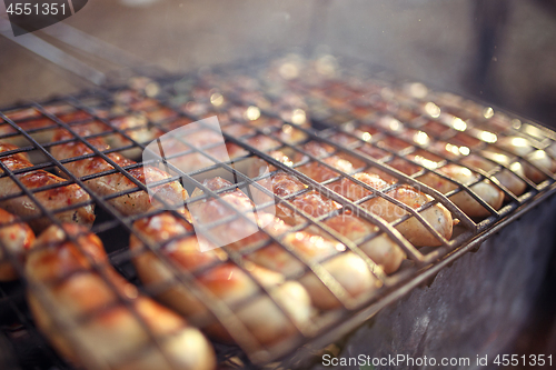 Image of Grilled sausage with smoke