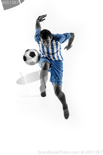 Image of Professional football soccer player with ball isolated on white background