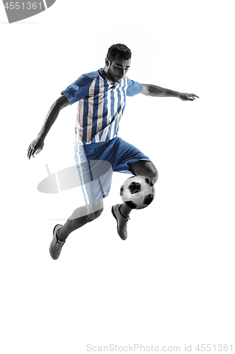 Image of Professional football soccer player with ball isolated on white background