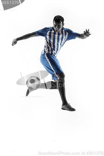 Image of Professional football soccer player with ball isolated on white background