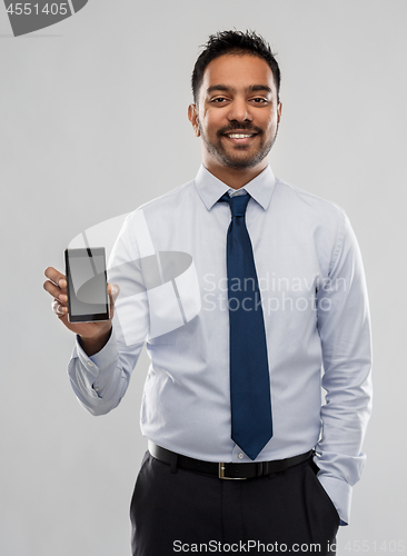 Image of indian businessman with smartphone