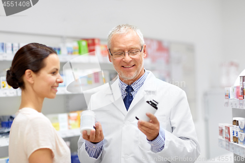 Image of apothecary and woman with drug at pharmacy