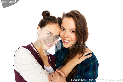 Image of happy smiling pretty teenage girls hugging