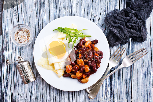 Image of fried bean with fried eggs