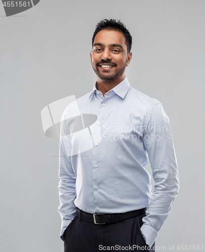 Image of indian businessman in shirt over grey background