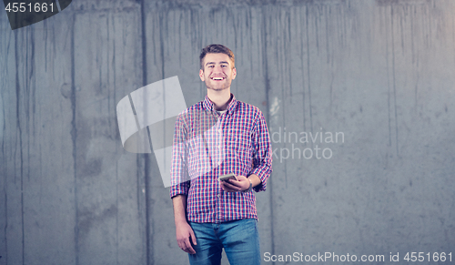 Image of business man displaying a spread of american dollar cash money