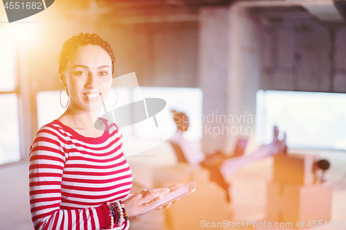 Image of modern muslim business woman on construction site