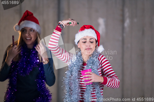 Image of multiethnic group of casual business people dancing with sparkle