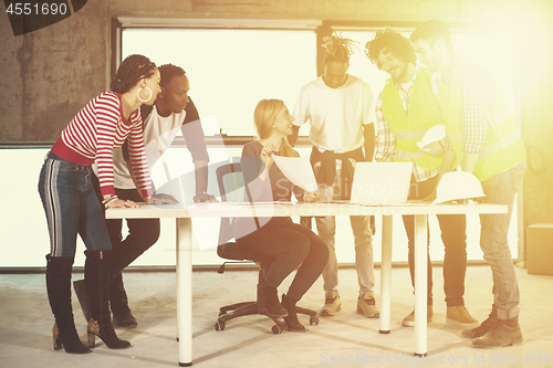 Image of multiethnic business people on construction site