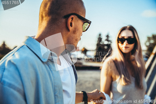 Image of Tanned young caucasian couple, modern lovestory in film grain effect