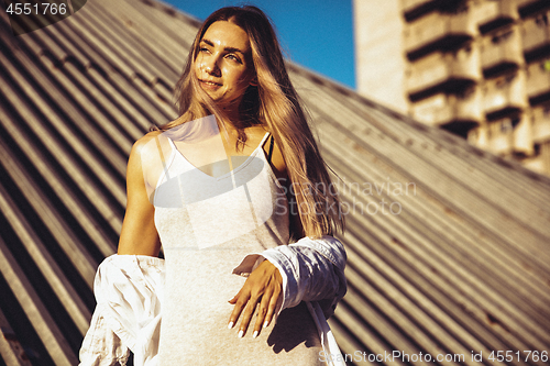 Image of Tanned young caucasian couple, modern lovestory in film grain effect