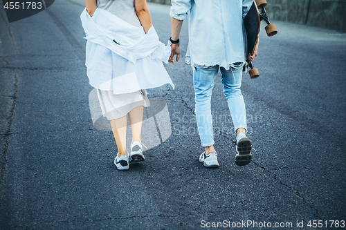 Image of Tanned young caucasian couple, modern lovestory in film grain effect