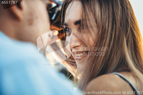 Image of Tanned young caucasian couple, modern lovestory in film grain effect