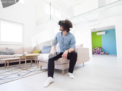 Image of man using VR-headset glasses of virtual reality