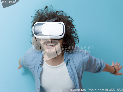 Image of man using VR headset glasses of virtual reality