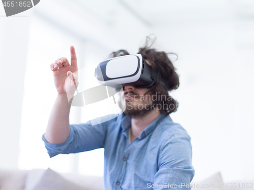 Image of man using VR-headset glasses of virtual reality