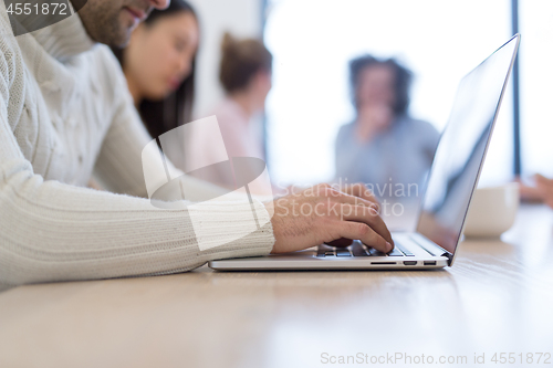 Image of Startup Business Team At A Meeting at modern office building