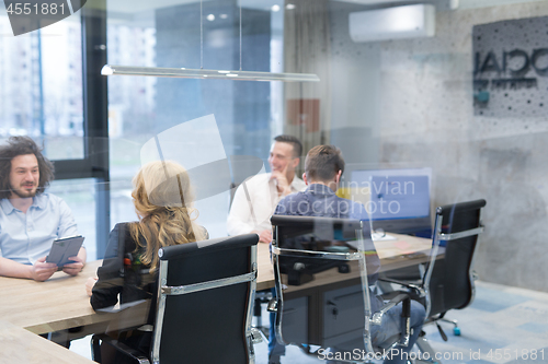 Image of Startup Business Team At A Meeting at modern office building