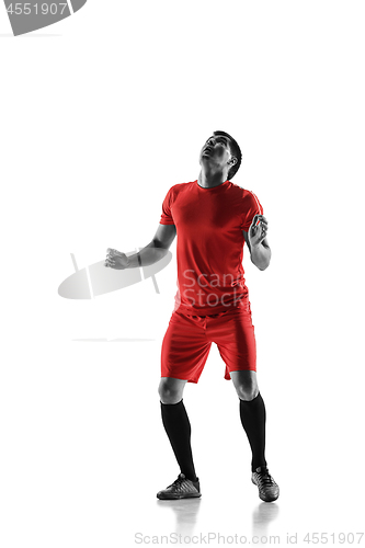 Image of Professional football soccer player isolated on white background