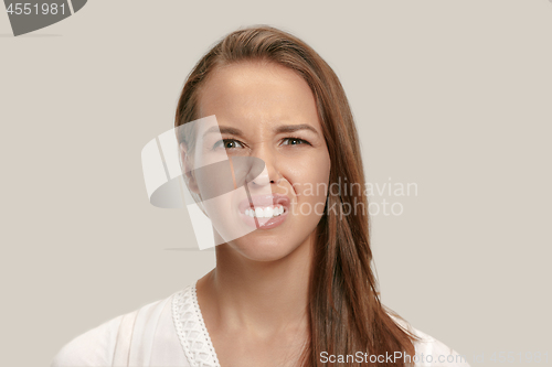 Image of Annoyed young woman feeling frustrated with something. Human facial expressions, emotions and feelings.