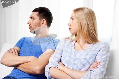 Image of unhappy couple having argument at home