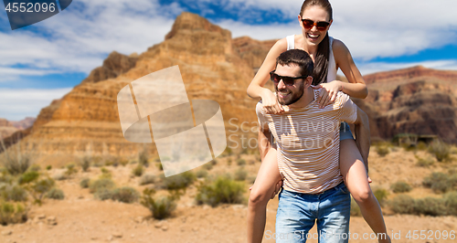 Image of happy couple having fun in summer