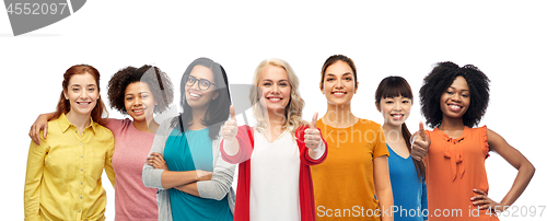 Image of international group of women showing thumbs up